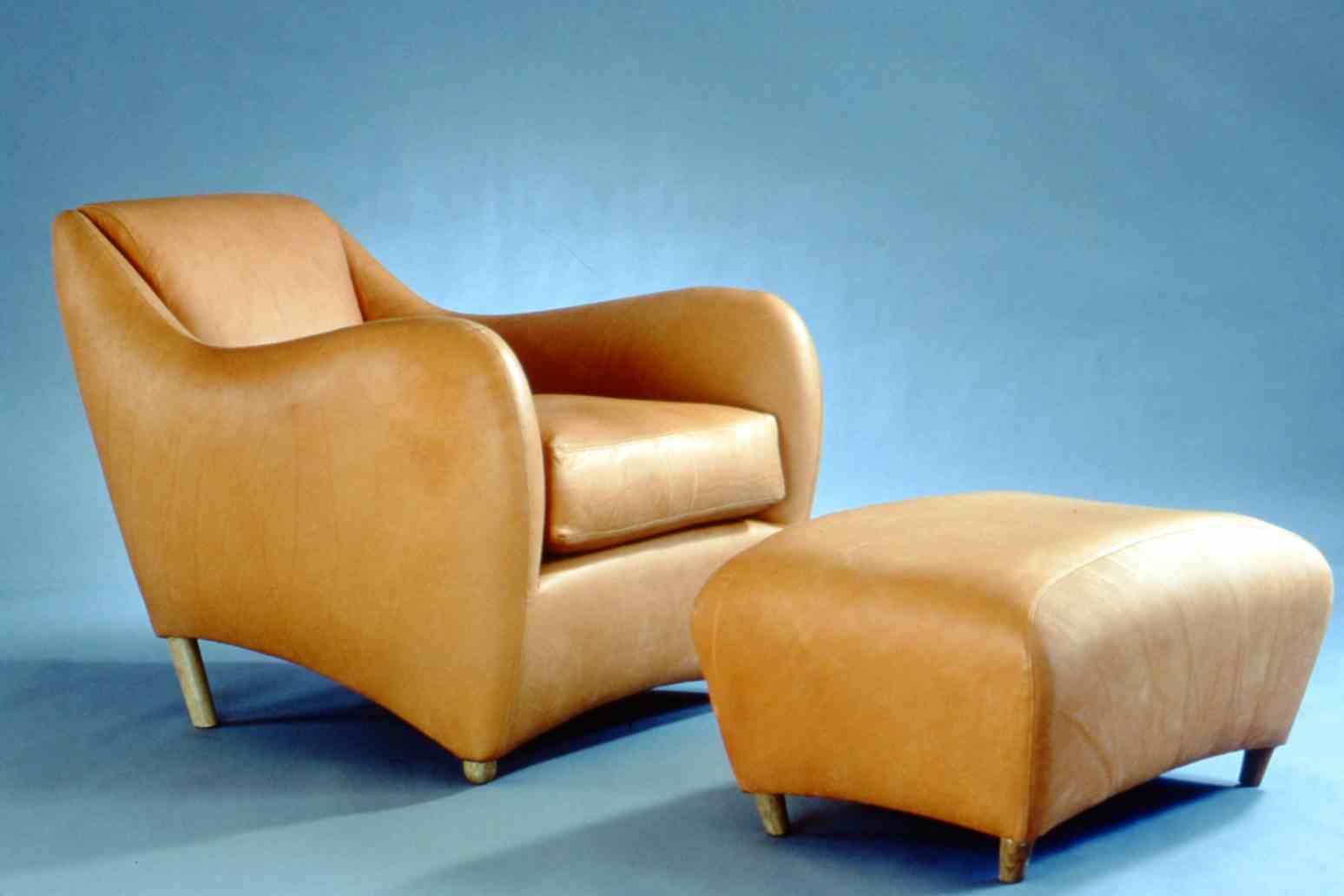 1990's early studio shoot of the Balzac armchair and ottoman.