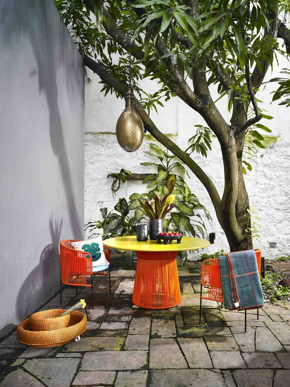 Ames furniture design caribe dining table orange insitu haute living