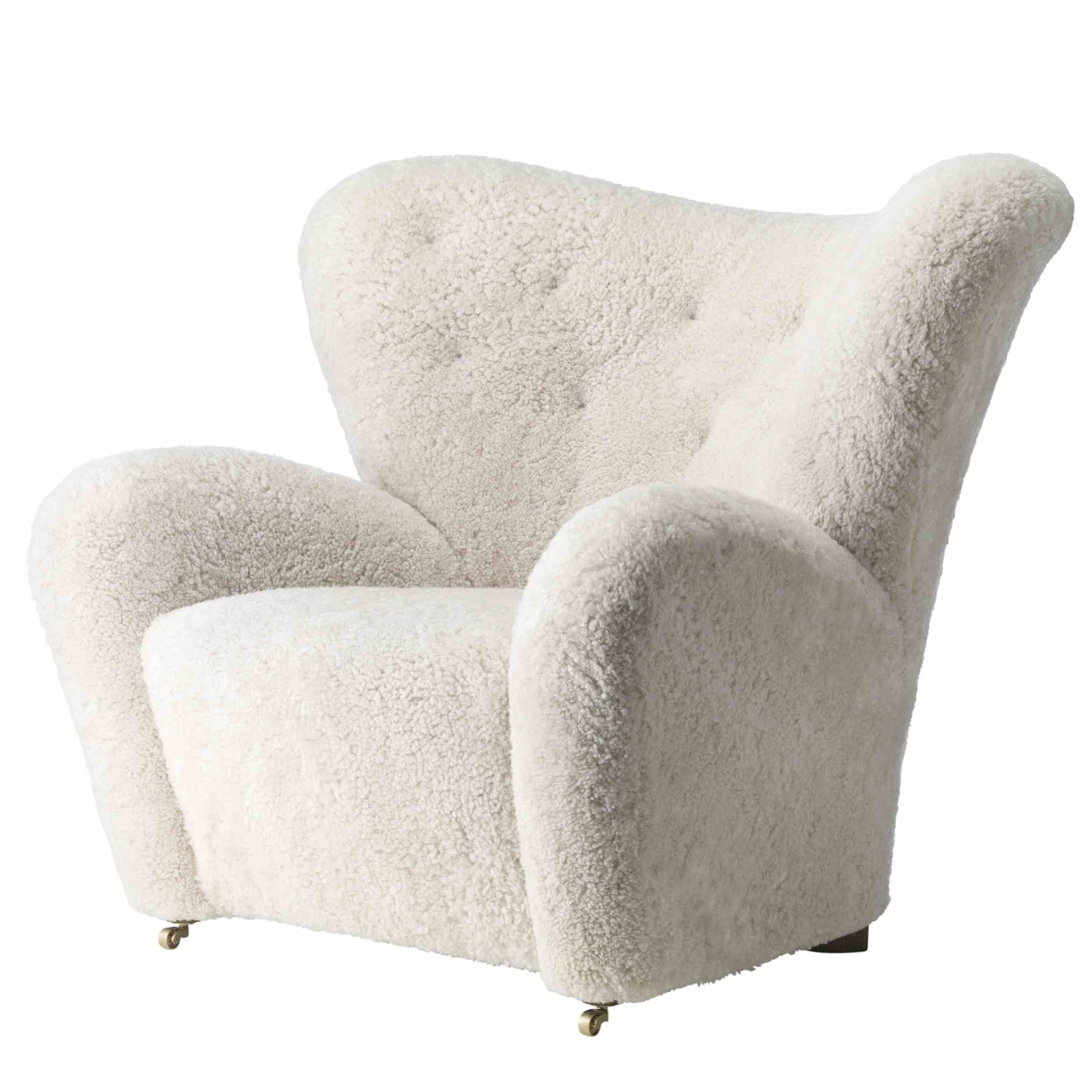 By lassen tired man chair sheepskin haute living