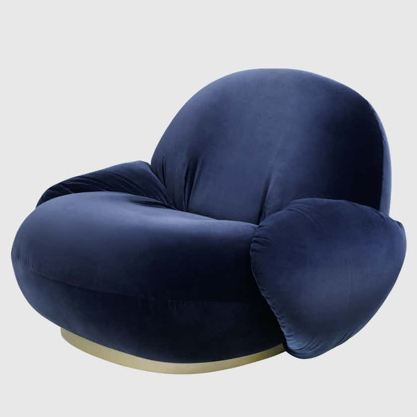 Gubi pacha lounge chair with armrest brass blue haute living